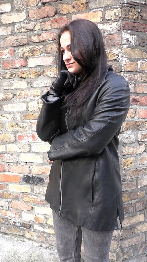 Girl-leather-gloves-wearing-leather-boots