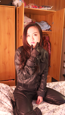 chinese-girl-in-leather-pants-and-leather-gloves-511