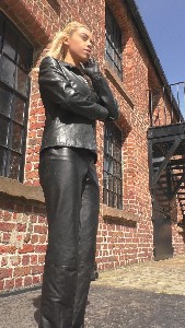 girl-in-leather-pants-and-gloves-with-leather-boots