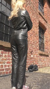 girl-in-leather-pants-and-gloves-with-leather-boots