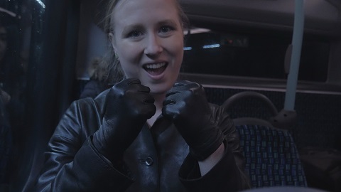 Girl-in-leather-gloves-with-gun-leather-jacket-overknee-leather-boots